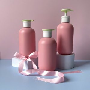 Chai HDPE Hồng vòi nhấn dẹp xanh