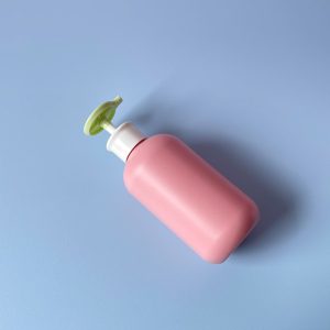 Chai HDPE Hồng vòi nhấn dẹp xanh