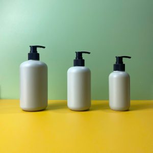 Chai HDPE tròn xanh vòi nhấn sóng sọc đen