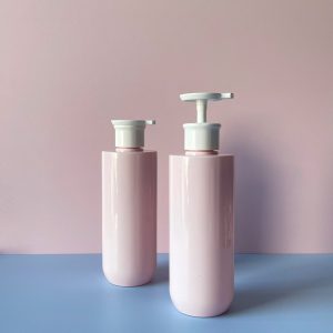 Chai PET Hồng vai ngang đáy bầu vòi nhấn dẹp Trắng 500ml