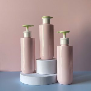 Chai PET Hồng vai ngang vòi nhấn dẹp Xanh