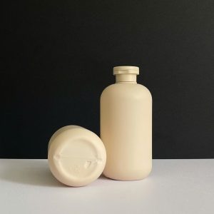 Chai HDPE nâu tròn nắp bật