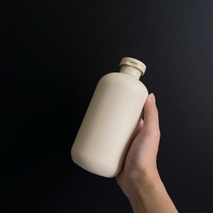 Chai HDPE nâu tròn nắp bật