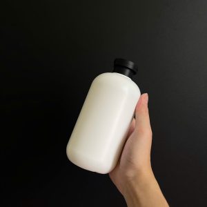 Chai HDPE tròn trắng nắp bật đen