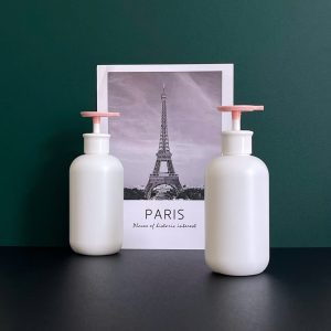 Chai HDPE tròn trắng vòi nhấn dẹp trắng hồng xanh