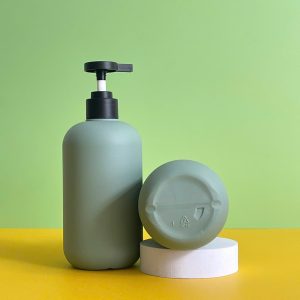 Chai HDPE tròn xanh đậm vòi nhấn dẹp đen