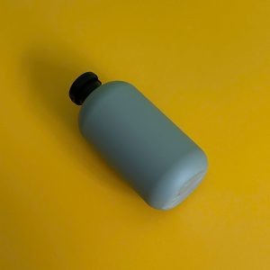 Chai HDPE tròn xanh đậm nắp bật đen