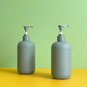 Chai HDPE tròn xanh đậm vòi nhấn sóng xanh trơn