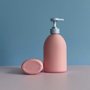 Chai HDPE hồng vai bầu tròn vòi nhấn dẹp xanh