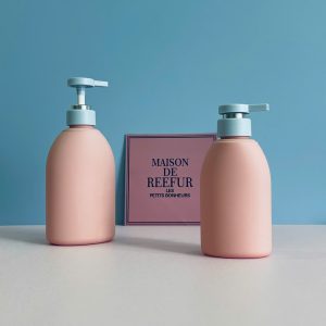 Chai HDPE hồng vai bầu tròn vòi nhấn dẹp xanh