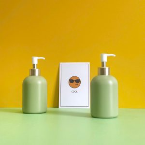 Chai HDPE xanh lá tròn lùn vòi nhấn kẹp trắng