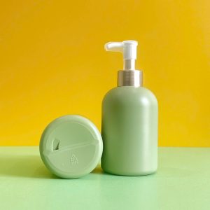 Chai HDPE xanh lá tròn lùn vòi nhấn kẹp trắng