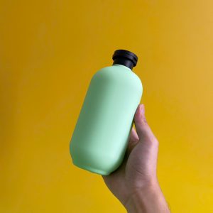 Chai đựng sữa tắm xanh hình trụ chất liệu HDPE nắp bật