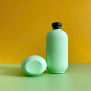 Chai đựng sữa tắm xanh hình trụ chất liệu HDPE nắp bật