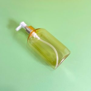 Chai đựng sữa tắm vàng trong PET vòi nhấn trắng nhọn