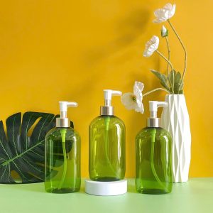 Chai đựng dầu gội PET xanh ngọc vòi nhấn kẹp trắng 500ml